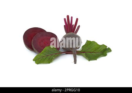 Sliced and whole fresh beetroot over whit Stock Photo