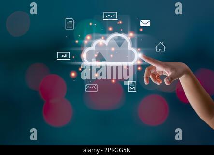 Finger pointing at the hologram cloud Represents search, communication, data storage with cloud computing. Stock Photo