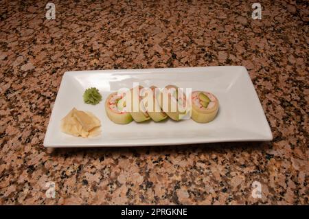 Traditional and authentic Japanese cusine know as a Sushi Roll Stock Photo