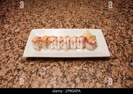 Traditional and authentic Japanese cusine know as a Sushi Roll Stock Photo