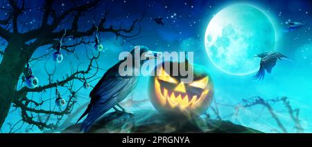 Horror background with scary crow in the darkness Stock Photo