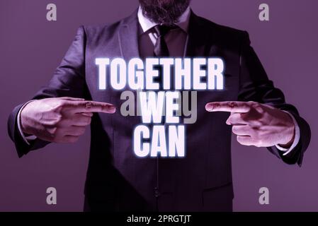 Sign displaying Together We Can. Word Written on Unity can makes everything possible One powerful group Man Holding Digital Display Futuristic Technology Computer System Stock Photo