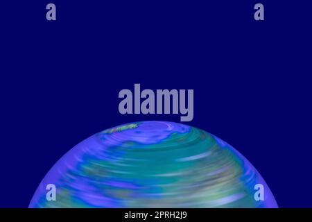 Background Earth shining. A luminous and rotating terrestrial globe or planet earth against dark background with space for design. Beautiful backdrop. Stock Photo