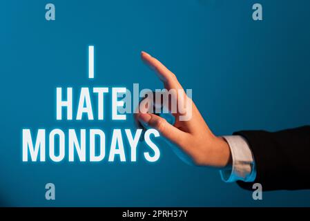 Text showing inspiration I Hate Mondays. Word for Not liking the first day of week Back to routine and job Buisnesswoman Presenting Important Messages On Presentation Board. Stock Photo
