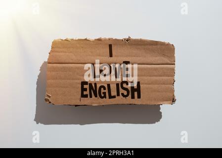 Text showing inspiration I Love English. Conceptual photo To have affection for international language Grammar Businesswoman Having Tablet On Desk And Pointing New Ideas With Pen. Stock Photo