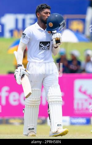 Galle, Sri Lanka. 27th April 2023. Nishan Madushka of Sri Lanka kisses his helmet after scoring his double century during the 4th day of the 2nd test cricket match between Sri Lanka vs Ireland at the Galle International Cricket Stadium in Galle on 27th April, 2023. Viraj Kothalawala/Alamy Live News Stock Photo