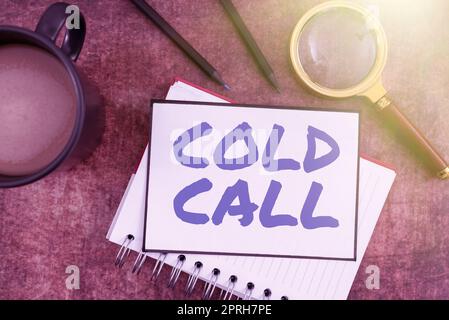 Sign displaying Cold Call, Word Written on Unsolicited call made by someone trying to sell goods or services Stock Photo