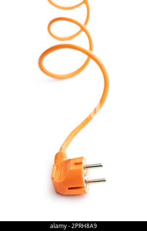 Orange electric plug isolated on white background. Stock Photo