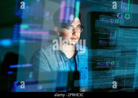 Hes a gifted programmer. a young computer programmer looking through data. Stock Photo