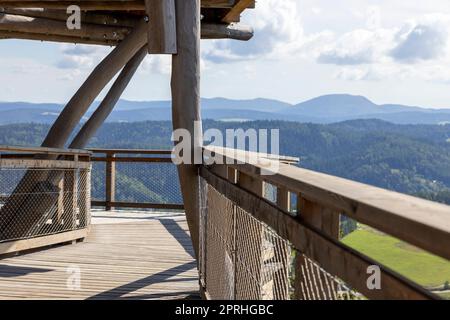 Observation tower located at the top of the Słotwiny Arena ski station, leading in the treetops, beautiful panorama of the mountain peaks, Krynica Zdroj, Beskid Mountains, Slotwiny, Poland Stock Photo