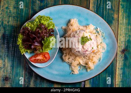 dumpling on sauerkraut Stock Photo
