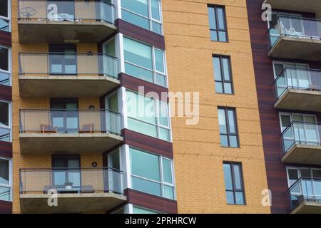 balconies apartment building residence skyscraper concrete and glass rental house Stock Photo