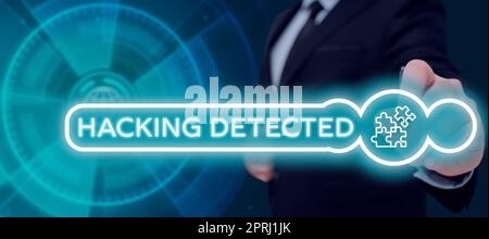 Handwriting text Hacking Detected, Business concept activities that seek to compromise affairs are exposed Man With A Pen Pointing On Jigsaw And Worki Stock Photo