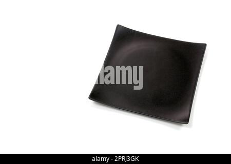 Empty black square ceramic plate with rough texture, isolated on white background with clipping path, Top view Stock Photo