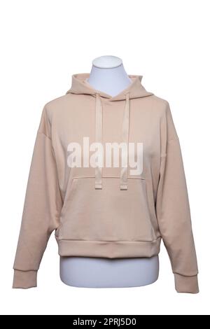 Female elegant beige hooded sweatshirt with long sleeves on mannequin for print isolated on a white background. Clipping path. Autumn fashion. Stock Photo