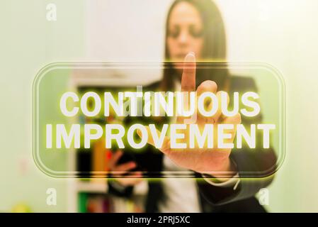 Sign displaying Continuous Improvement, Business idea making small consistent improvements over time Businesswoman Holding Cellphone And Pointing New Stock Photo