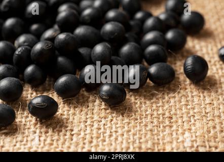 Black soybeans placed on jute Stock Photo - Alamy