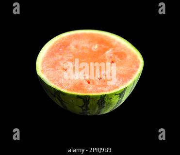 Watermelon slice isolated on black background Stock Photo