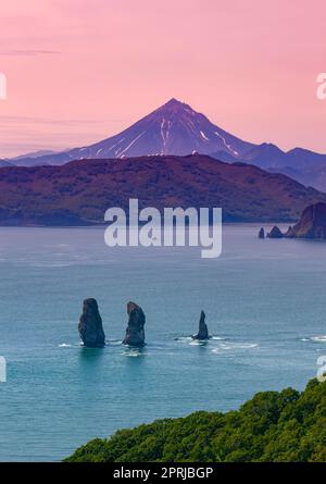 Three Brothers Rocks in Avacha Bay. Kamchatka Peninsula Stock Photo