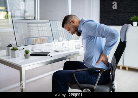 Man With Back Pain Stock Photo