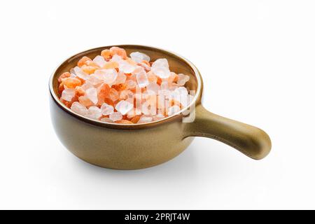 Pink Himalayan salt in a ceramic bowl isolated on white background Stock Photo