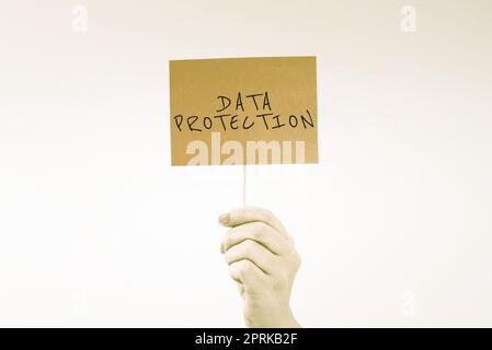 Handwriting text Data Protection, Business idea safeguarding information away from a possible data breach Stock Photo