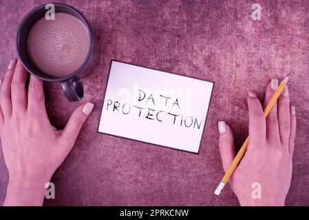 Handwriting text Data Protection, Conceptual photo safeguarding information away from a possible data breach Stock Photo