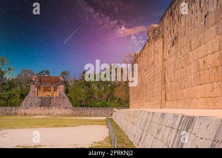 Stone wall with a ring of Grand Ball Court, Gran Juego de Pelota of Chichen Itza archaeological site in Yucatan, Mexico with Milky Way Galaxy stars ni Stock Photo
