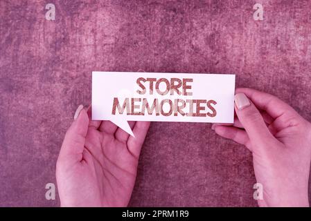 Sign displaying Store Memories, Word Written on a systematic process of envisioning a desired future Businessman Holding Speech Bubble With Important Stock Photo
