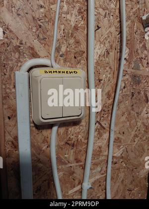 Signed power light switch in a the apartment Stock Photo