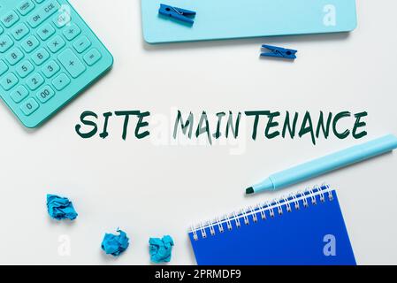 Hand writing sign Site Maintenance, Business overview Monitoring and regularly checking your website for issues Stock Photo