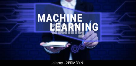 Handwriting text Machine Learning, Business overview the concept that a computer can learn new data itself Stock Photo