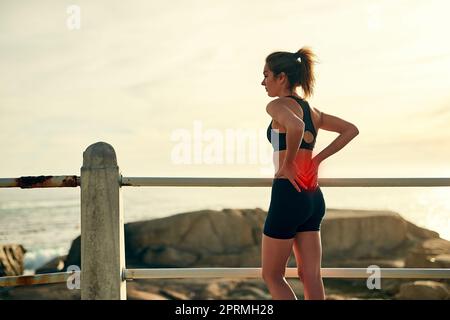 Hurting Neck - Female Runner Showing Pain With Red Circle. Athletic Running  Woman With Injury In Sportswear Rubbing Touching Upper Back Muscles Outside  After Exercising And Training. Stock Photo, Picture and Royalty