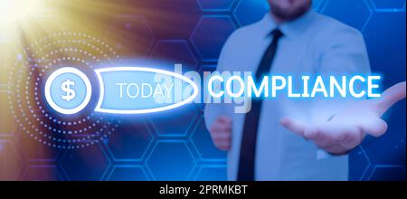 Writing displaying text Compliance, Business concept the action or fact of complying with a wish or commands Businessman Showing A Digital And Present Stock Photo