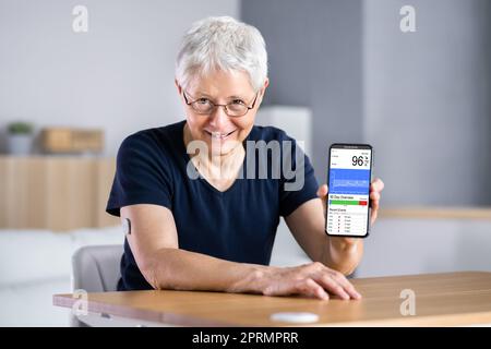 Continuous Glucose Monitor Blood Sugar Test Smart Phone Stock Photo