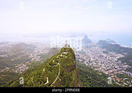 Christ the Redeemer overlooking the city Rio. Aerial view of Rio De Janeiro, Brazil. Stock Photo