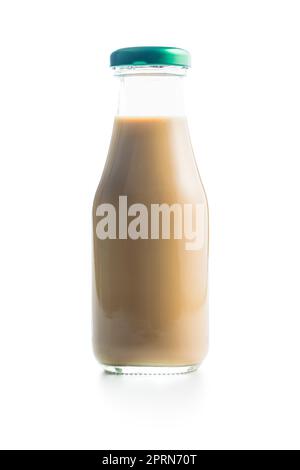 Coffee milk in glass bottle isolated on the white background. Stock Photo