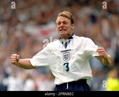 File photo dated 22-06-1996 of Stuart Pearce celebrating after scoring in the penalty shoot-out to decide today's (Sat) Euro 96 quarter final clash against Spain, at Wembley. Photo by Sean Dempsey/PA. Stuart Pearce was elated after converting a penalty in England's quarter-final shoot-out victory over Spain at Euro 96. Six years earlier his miss against West Germany had condemned England to a World Cup semi-final shoot-out defeat. Issue date: Thursday April 27, 2023. Stock Photo
