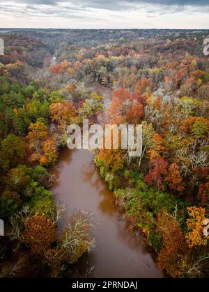An aerial view of an idyllic autumnal scene with a tranquil river Stock Photo