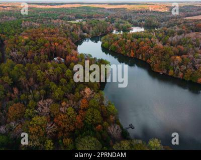 An aerial view of an idyllic autumnal scene with a tranquil with a river Stock Photo
