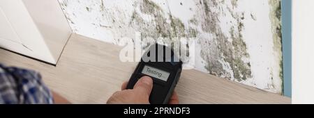 Mold Tester And Spores Test In House. Measure Wet Wall Stock Photo