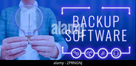 Writing displaying text Backup Software, Business concept boundary across which two independent systems meet and act Woman With A Light Bulb Image In Stock Photo