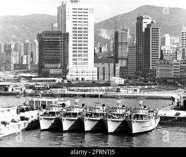 Rare sight of all 5 ships of the Royal Navy Hong Kong Squadron rafted up in the basin at HMS Tamar, Hong Kong, in 1976. Stock Photo