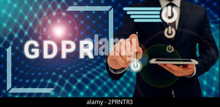 Text caption presenting Gdpr, Concept meaning regulation in EU law on data protection and privacy in European Union Man Holding A Pen And Tablet With Stock Photo
