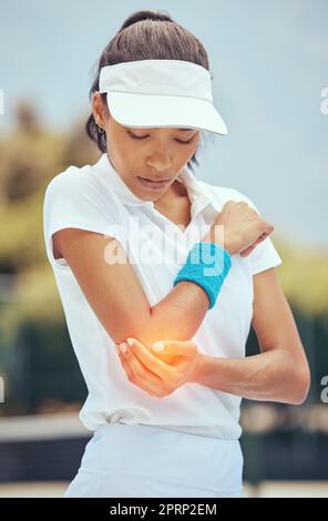 Tennis woman, elbow pain and abstract injury on sports court in wellness exercise, training and health workout. Fitness stress, burnout and medical emergency or arm accident for athlete in match game Stock Photo
