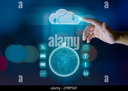 Finger pointing at the hologram cloud Represents search, communication, data storage with cloud computing. Stock Photo