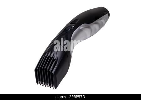 Close-up of a new black silver rechargeable beard and hair clipper isolated on a white background. Clipping path. Cordless hair and beard trimmer. Macro. Stock Photo