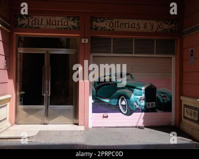 Mural painting on garage door. Málaga, Spain. Stock Photo