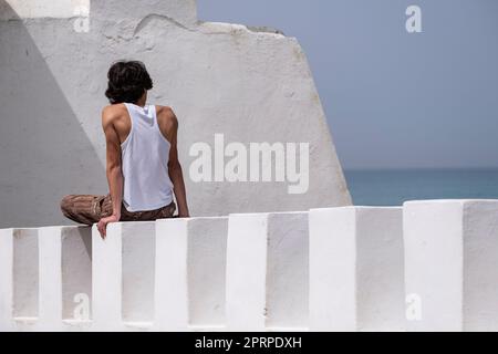 tourist on the wall, Asilah, morocco, africa Stock Photo