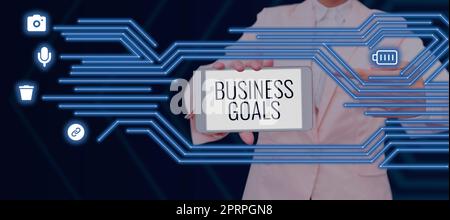 Conceptual caption Business Goals, Concept meaning Marketing Methodologies Processes and Technologies use Man With Tablet Displaying S And Glowing Lin Stock Photo